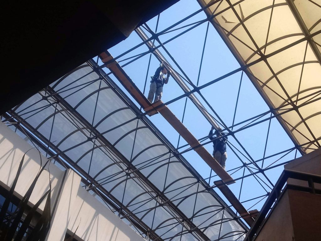 white metal framed glass roof